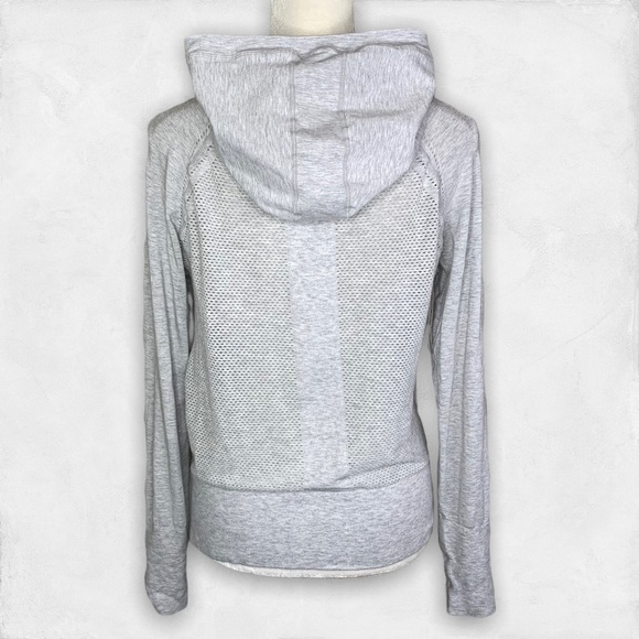 Fabletics Tops - Fabletics gray perforated hoodie XL cross neck pullover lightweight hooded top
